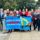 Conservative candidates for the Bassetlaw District Council 2023 local elections holding a banner opposing Labour's housing plan